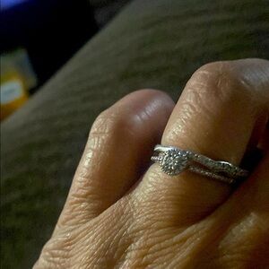 Silver Halo Diamond Ring with Delicate Band
.925 1/20PT